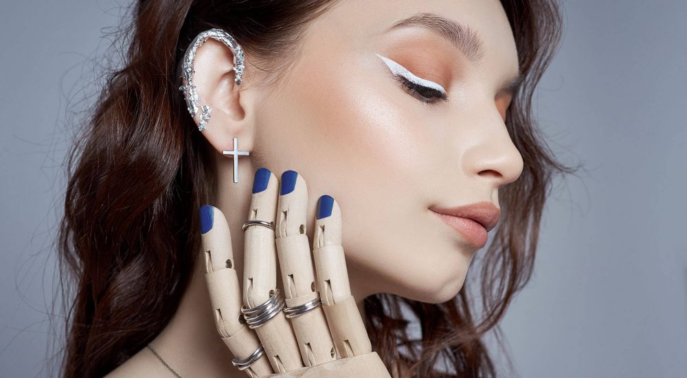 beauty-portrait-woman-with-natural-makeup-painted-polished-nails-her-hand