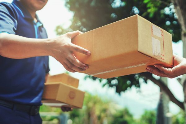 delivery-man-delivering-holding-parcel-box-customer